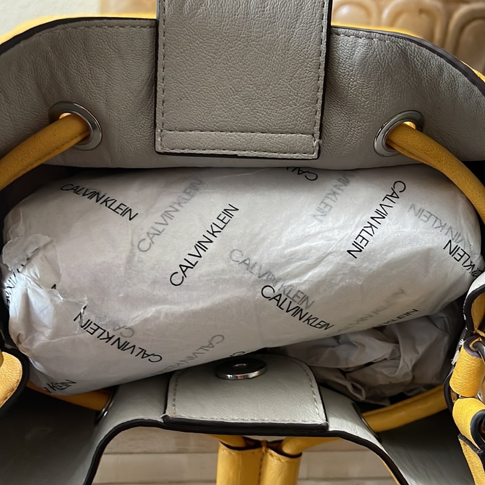 Interior picture of yellow Calvin Klein bag. Noticed flaw on interior